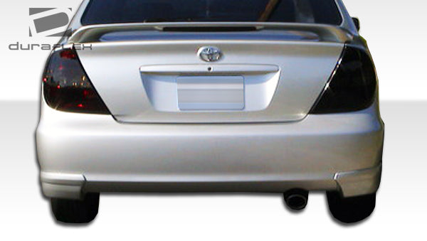 2002-2004 Toyota Camry Duraflex Vortex Body Kit - 6 Piece - Includes Vortex Front Lip Under Spoiler Air Dam (104216) Vortex Rear Add On Bumper Spat Extensions (104218) Vortex Side Skirts Rocker Panels (104217) Vortex Front Grille (104215)