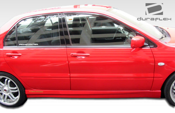 2002-2003 Mitsubishi Lancer Duraflex Evo 7 Body Kit - 4 Piece - Includes Evo 7 Front Bumper Cover (100369) Walker Rear Bumper Cover (100371) Walker Side Skirts Rocker Panels (100372)