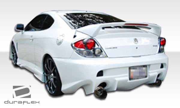 2003-2006 Hyundia Tiburon Duraflex Vader Body Kit - 4 Piece - Includes Vader Front Bumper Cover (100451) Vader Rear Bumper Cover (100452) Vader Side Skirts Rocker Panels (100453)