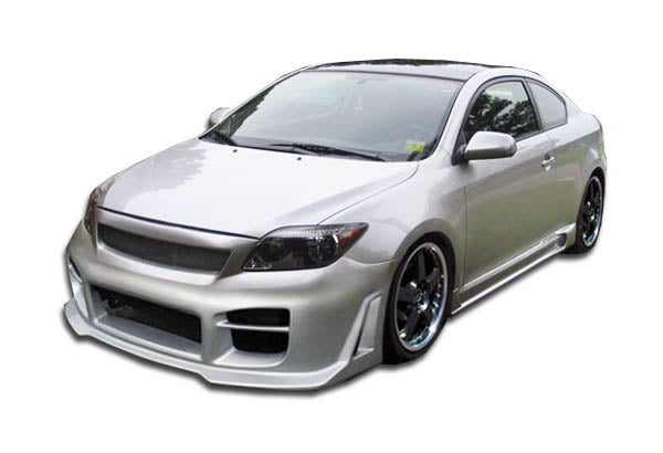 2005-2010 Scion tC Duraflex R34 Body Kit - 4 Piece - Includes R34 Front Bumper Cover (103457) Raven Side Skirts Rocker Panels (100672) Raven Rear Bumper Cover (100673)