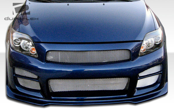 2005-2010 Scion tC Duraflex R34 Body Kit - 4 Piece - Includes R34 Front Bumper Cover (103457) Raven Side Skirts Rocker Panels (100672) Raven Rear Bumper Cover (100673)