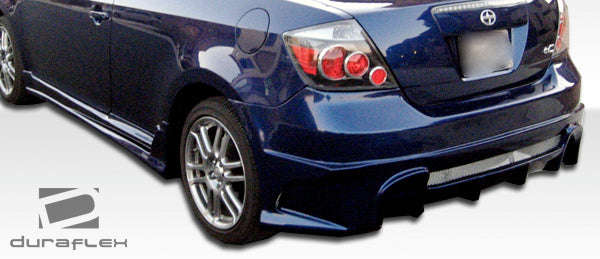 2005-2010 Scion tC Duraflex Raven Body Kit - 4 Piece - Includes Raven Front Bumper Cover (100671) Raven Rear Bumper Cover (100672) Raven Side Skirts Rocker Panels (100673)