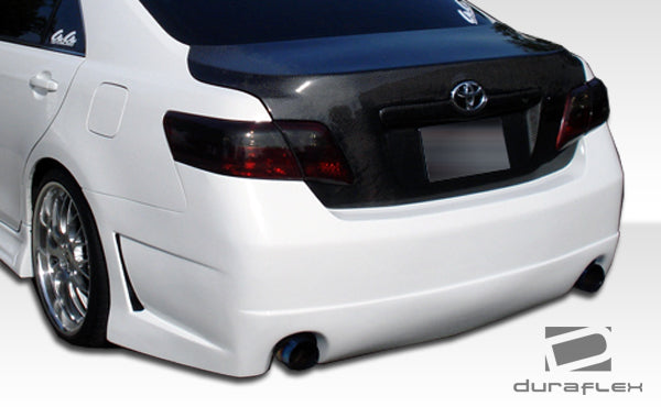 2007-2009 Toyota Camry Duraflex B-2 Body Kit - 4 Piece - Includes B-2 Front Bumper Cover (104350) B-2 Rear Bumper Cover (104352) B-2 Side Skirts Rocker Panels (104351)