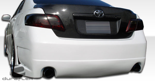 2007-2009 Toyota Camry Duraflex B-2 Body Kit - 4 Piece - Includes B-2 Front Bumper Cover (104350) B-2 Rear Bumper Cover (104352) B-2 Side Skirts Rocker Panels (104351)