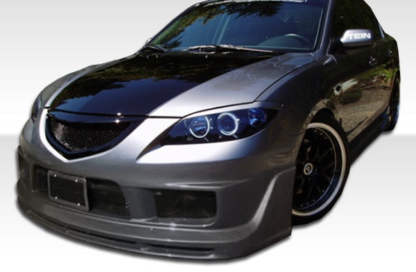2004-2009 Mazda 3 4DR K-2 Body Kit - 4 Piece - Includes K-2 Front Bumper Cover (104902) I-Spec Rear Bumper Cover (104480) I-Spec Side Skirts Rocker Panels (104481)