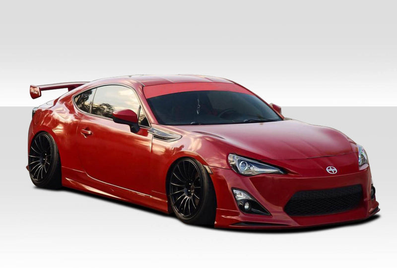 2013-2016 Scion FR-S  Duraflex Modellista Look Body Kit - 7 Piece - Includes Modellista Look Front Lip Under Air Dam Spoiler (112203) Modellista Look Side Skirt Rocker Panels (112204) Modellista Look Rear Add Ons Spat Extensions (112205)