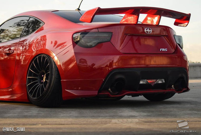 2013-2016 Scion FR-S  Duraflex Modellista Look Body Kit - 7 Piece - Includes Modellista Look Front Lip Under Air Dam Spoiler (112203) Modellista Look Side Skirt Rocker Panels (112204) Modellista Look Rear Add Ons Spat Extensions (112205)