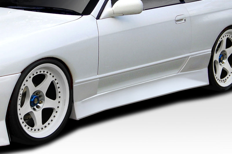 1989-1994 Nissan Skyline R32 2DR Duraflex V-Speed Body Kit - 4 Piece - Includes V-Speed Front Bumper (113562) V-Speed Side Skirts (113563) V-Speed Rear Bumper (113564)