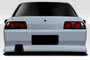 1989-1994 Nissan Skyline R32 4DR Duraflex V-Speed Body Kit - 4 Piece - Includes V-Speed Front Bumper (113562) V-Speed Side Skirts (113565) V-Speed Rear Bumper (113566)