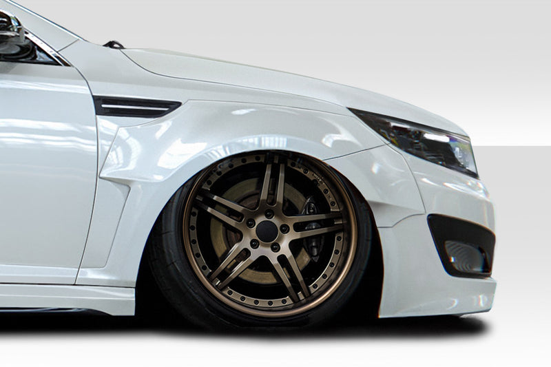 2011-2013 Kia Optima Duraflex CPR Body Kit - 14 Piece - Includes 116099 CPR Front Lip, 116103 CPR Side Skirts,, 116104 CPR Front Fender Flares, 116105 CPR Rear Fender Flares. 116102 CPR Rear Wing Spoiler 