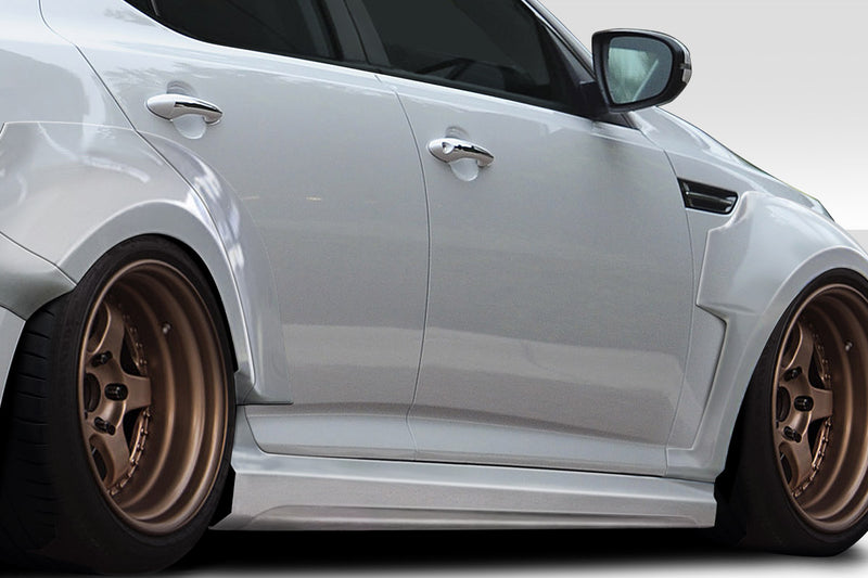 2011-2013 Kia Optima Duraflex CPR Body Kit - 14 Piece - Includes 116099 CPR Front Lip, 116103 CPR Side Skirts,, 116104 CPR Front Fender Flares, 116105 CPR Rear Fender Flares. 116102 CPR Rear Wing Spoiler 