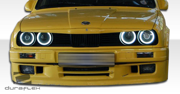 1984-1987 BMW 3 Series E30 2DR Duraflex M-Tech Body Kit - 6 Piece - Includes M-Tech Front Bumper Cover (105323) M-Tech Side Skirts Rocker Panels (105046) M-Tech Door Panels (105048) M-Tech Rear Bumper Cover (105324)