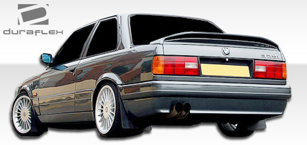 1984-1987 BMW 3 Series E30 2DR Duraflex M-Tech Body Kit - 4 Piece - Includes M-Tech Front Bumper Cover (105323) M-Tech Side Skirts Rocker Panels (105046) M-Tech Rear Bumper Cover (105324)