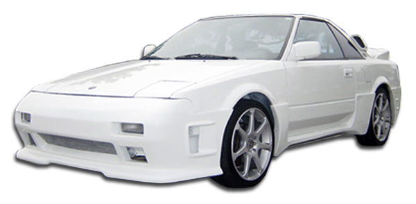 1985-1989 Toyota MR2 Duraflex F-1 Body Kit - 4 Piece - Includes F-1 Front Bumper Cover (100702) F-1 Rear Bumper Cover (100703) F-1 Side Skirts Rocker Panels (100704)