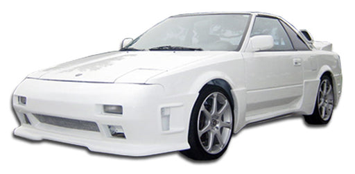 1985-1989 Toyota MR2 Duraflex F-1 Body Kit - 4 Piece - Includes F-1 Front Bumper Cover (100702) F-1 Rear Bumper Cover (100703) F-1 Side Skirts Rocker Panels (100704)