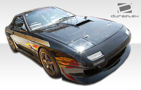 1986-1991 Mazda RX-7 Duraflex GP-1 Body Kit - 4 Piece - Includes GP-1 Front Bumper Cover (100725) GP-1 Rear Bumper Cover (100726) GP-1 Side Skirts Rocker Panels (100727)