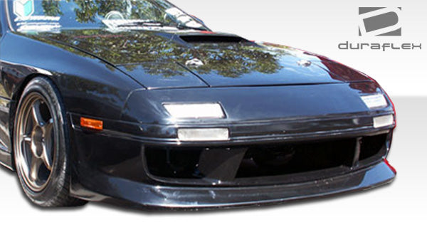 1986-1991 Mazda RX-7 Duraflex GP-1 Body Kit - 4 Piece - Includes GP-1 Front Bumper Cover (100725) GP-1 Rear Bumper Cover (100726) GP-1 Side Skirts Rocker Panels (100727)