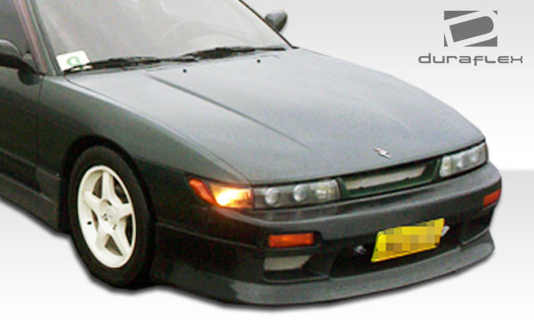 1989-1994 Nissan 240SX S13 Duraflex Silvia S13 Conversion V-Speed Kit - 4 Piece - Includes S13 Conversion V-Speed Front Bumper Cover (102204) S13 Conversion M-1 Sport Fenders (100877) S13 Conversion M-1 Sport Hood (102203)