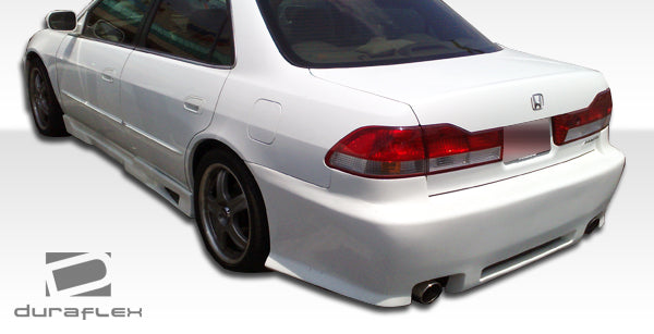 1998-2002 Honda Accord 4DR Duraflex R34 Body Kit - 4 Piece - Includes R34 Front Bumper Cover (101991) Spyder Rear Bumper Cover (101985) Spyder Side Skirts Rocker Panels (101986)