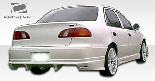 1998-2000 Toyota Corolla Duraflex Bomber Body Kit - 4 Piece - Includes Bomber Front Bumper Cover (102031) Bomber Rear Bumper Cover (102032) Bomber Side Skirts Rocker Panels (102033)