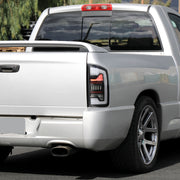 Spec-D 02-06 Dodge Ram 1500 2500 3500 Full Led Bar Tail Light Matte Black Housing Clear Lens White Led Bar LT-RAM02JMLED-G2-RS