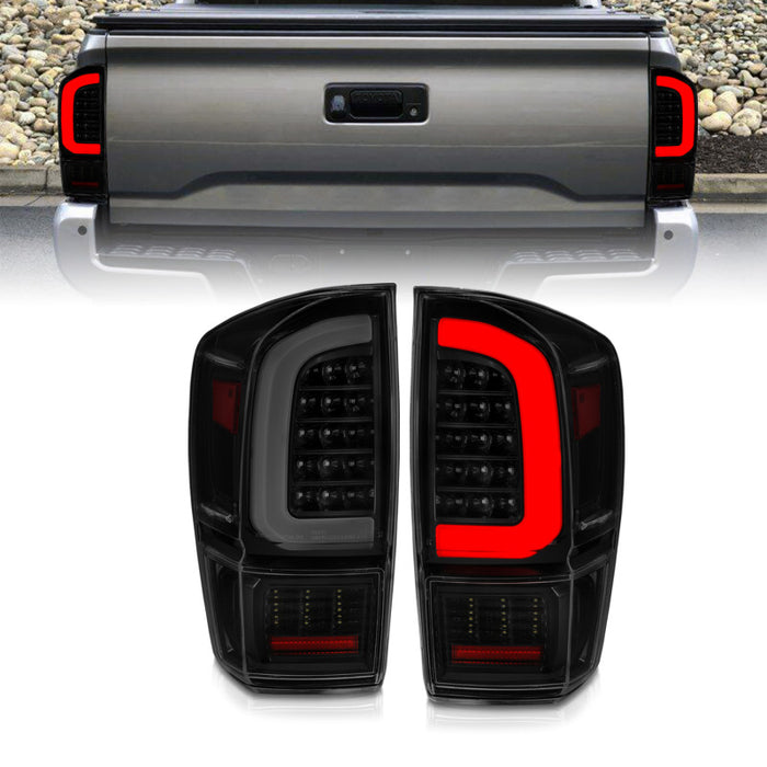 ANZO 16-21 Feux arrière LED Toyota Tacoma avec barre lumineuse séquentielle boîtier noir et lentille fumée